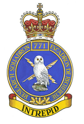 771 Comm Rsch Sqn  crest
Ottawa, Ontario

Approval of a Badge March 1, 1992

Blazon

Badge

Azure a lightning bolt and quill pen in saltire Or surmounted by a snowy owl on a mount proper;

Motto

INTREPID;
