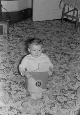 Mike Bostwick
Me in 1958 trying to fit into same box my sister Denise disappeared into
